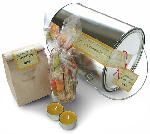 Gallon paint can containing a half pound of organic espresso beans from Continental Coffee, pistachio biscottis from Fratelli's Bakery and beeswax candles from Dream Designs, all labeled and designed by design hq inc. as a self promotion