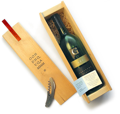 Hand made gift box containing a bottle of 2002 Gray Monk Latitude 50 Red, a premium quality stainless steel corkscrew and pairing suggestions designed by design hq inc. as a self promotion